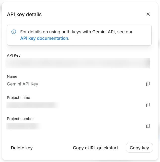 Google AI Studio's API key details window, with the key hidden and a Copy key button